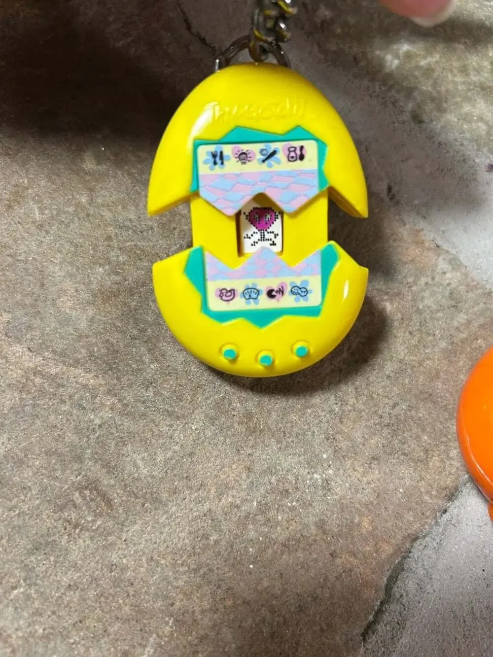 McDonalds Tamagotchi Keychains Orange and Yellow